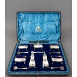 A CASED EDWARD VII SILVER CONDIMENT SET, E S BARNSLEY AND CO, BIRMINGHAM, 1909