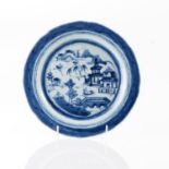 A CHINESE BLUE AND WHITE RIVER LANDSCAPE PLATE, QING DYNASTY, 19TH CENTURY
