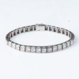 A DIAMOND TENNIS BRACELET