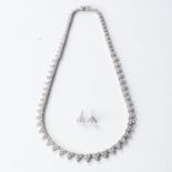 A DIAMOND NECKLACE AND MATCHING EARRINGS