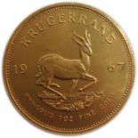 A GOLD ONE OUNCE KRUGERRAND MINTED 1967