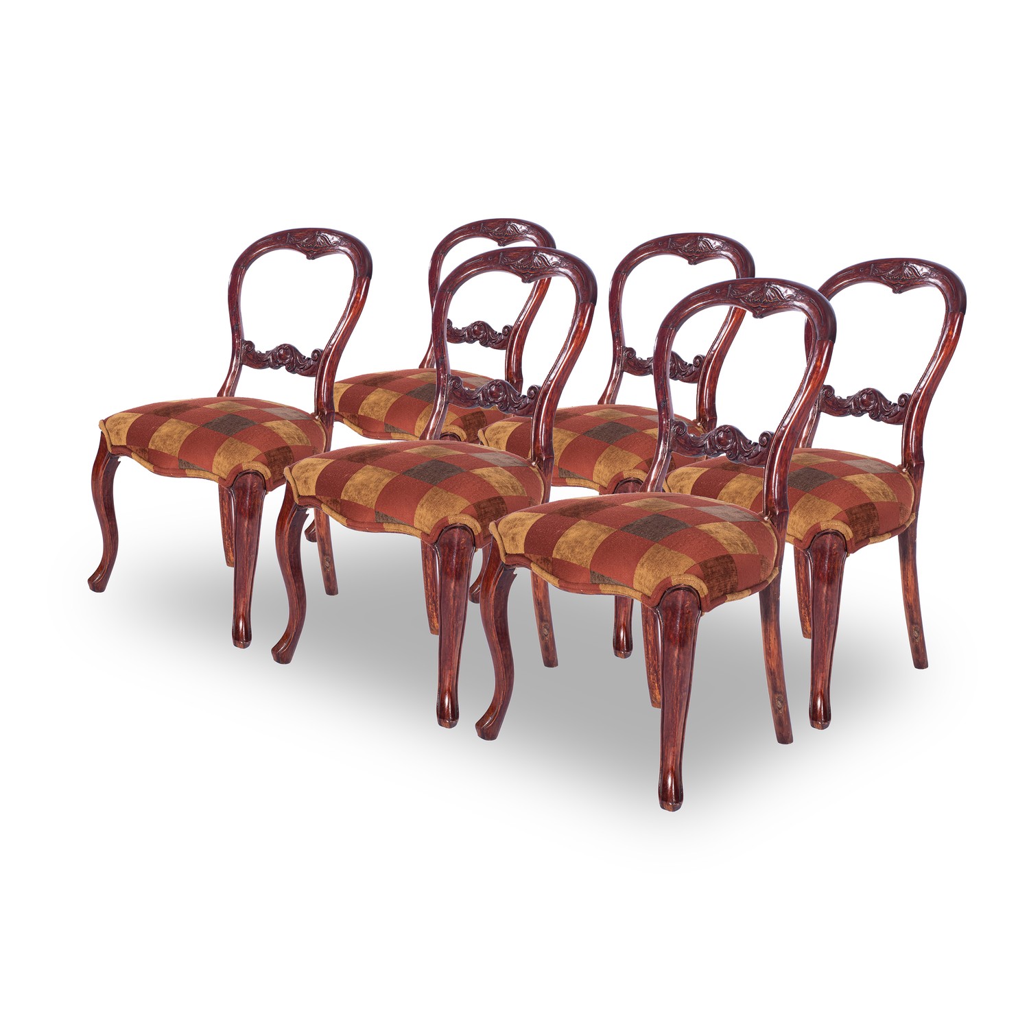 A SET OF SIX VICTORIAN WALNUT CHAIRS