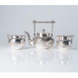 A CHINESE SILVER THREE-PIECE TEA SET