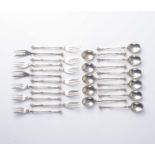 ELEVEN SILVER MOCCA SPOONS AND TWELVE CAKE FORKS