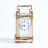 A BRASS CARRIAGE CLOCK