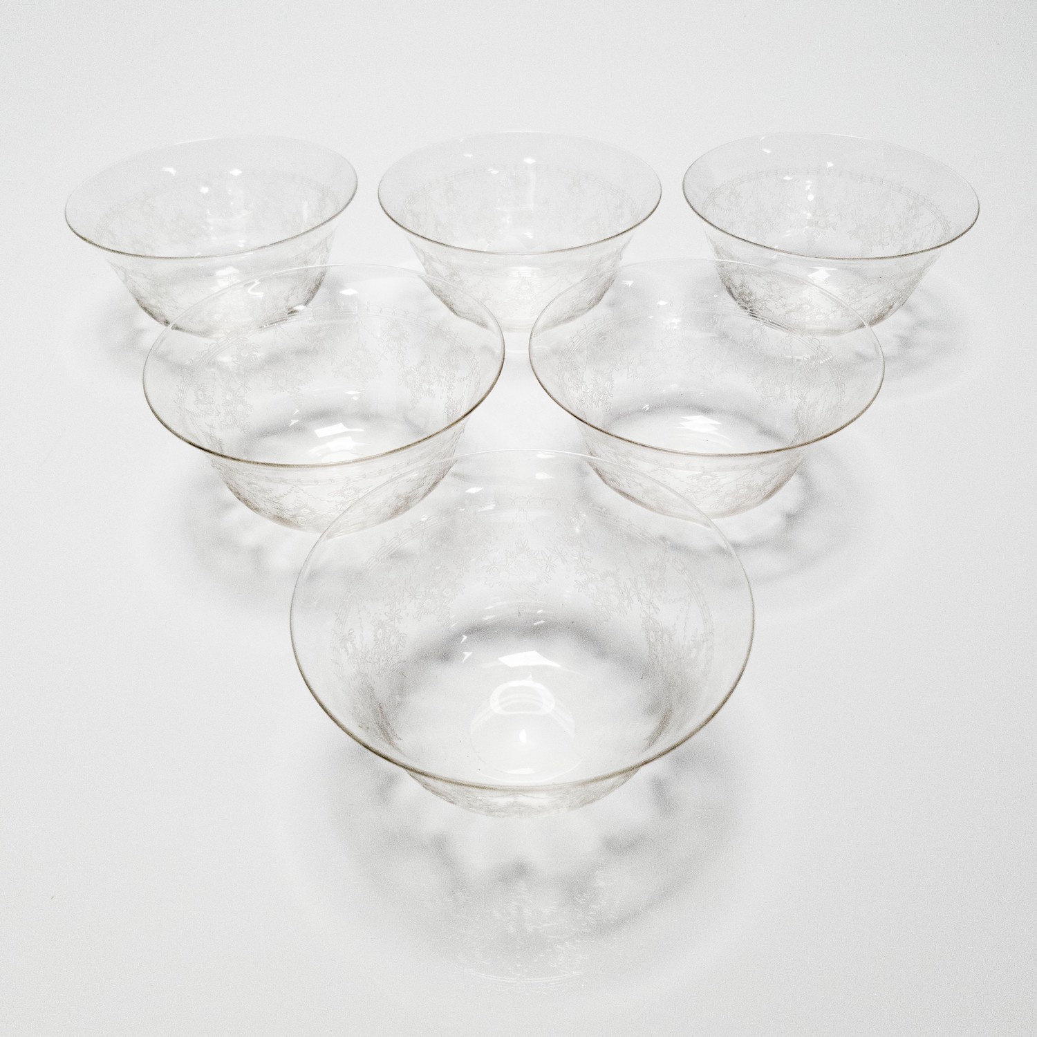 A SET OF 6 CUT-GLASS PUDDING BOWLS