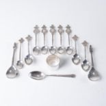 A COLLECTION OF SILVER SPOONS AND A SERVIETTE RING