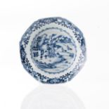 A CHINESE BLUE AND WHITE PINE AND PAGODA PLATE, QING DYNASTY, 18TH CENTURY