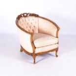 A VICTORIAN STYLE TUB CHAIR