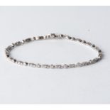 A DIAMOND TENNIS BRACELET