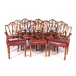 A SET OF TEN HEPPLEWHITE STYLE MAHOGANY DINING CHAIRS