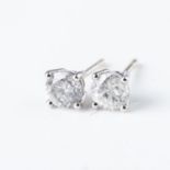 A PAIR OF DIAMOND STUD EARRINGS