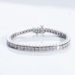 A DIAMOND TENNIS BRACELET