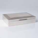 A SILVER CIGARETTE BOX