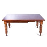 A MAHOGANY EXTENDING DINING TABLE, EARLY 20TH CENTURY
