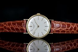GENTLEMANS VINTAGE PATEK PHILIPPE WRISTWATCH, round, silver dial with gold hands, gold markers,