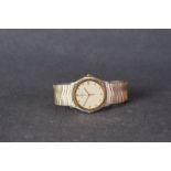 GENTLEMENS EBEL CLASSIC WAVE WRISTWATCH, circular cream dial with gold dot hour markers and hands,