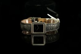 LADIES 18K WHITE GOLD VINTAGE PIAGET 8354 CIRCA 1999, oblong, black dial with silver sword hands,