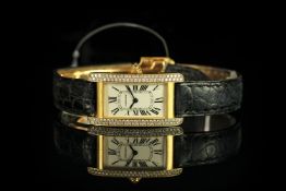 LADIES 18K DIAMOND SET CARTIER AMERICAINE , MODEL 1710,oblong dial, beige face with blue hands,