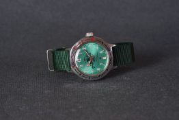 GENTLEMENS VOSTOK DIVERS WRISTWATCH, circular green dial with arabic numeral hour markers and hands,