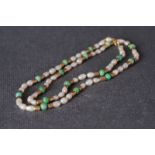 18CT GOLD JADE & PEARL NECKLACE, a necklace set with pearl and jade beads, also set with 18ct marked