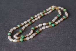 18CT GOLD JADE & PEARL NECKLACE, a necklace set with pearl and jade beads, also set with 18ct marked
