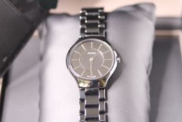 GENTLEMENS RADO TRUE THINLINE WRISTWATCH W/BOX & PAPERS, circular black dial with hour markers, 30mm