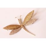 Dragonfly Brooch, pave set with diamonds and yellow sapphires, 67mm x 53mm at widest points, total