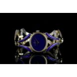 LADIES BAUME & MERCIER ENAMEL WRISTWATCH, oval lapis lazuli dial, stone set crown, 25mm 18ct