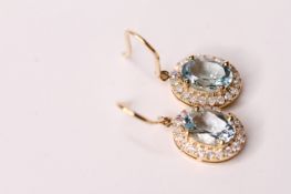 Pair of Natural Aquamarine & Diamond Earrings, set with 2 oval cut aquamarines totalling 1.05ct,