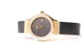 18CT LADIES HUBLOT GENEVE , black circular dial, date aperture, diamond set 18ct yellow gold case,