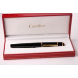 Diabolo de Cartier Fountain Pen with a black composite body, yellow golden finish trim details,