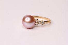 Cultured Pearl & Diamond Ring, set with 1 round cultured pearl and 8 round brilliant cut diamonds