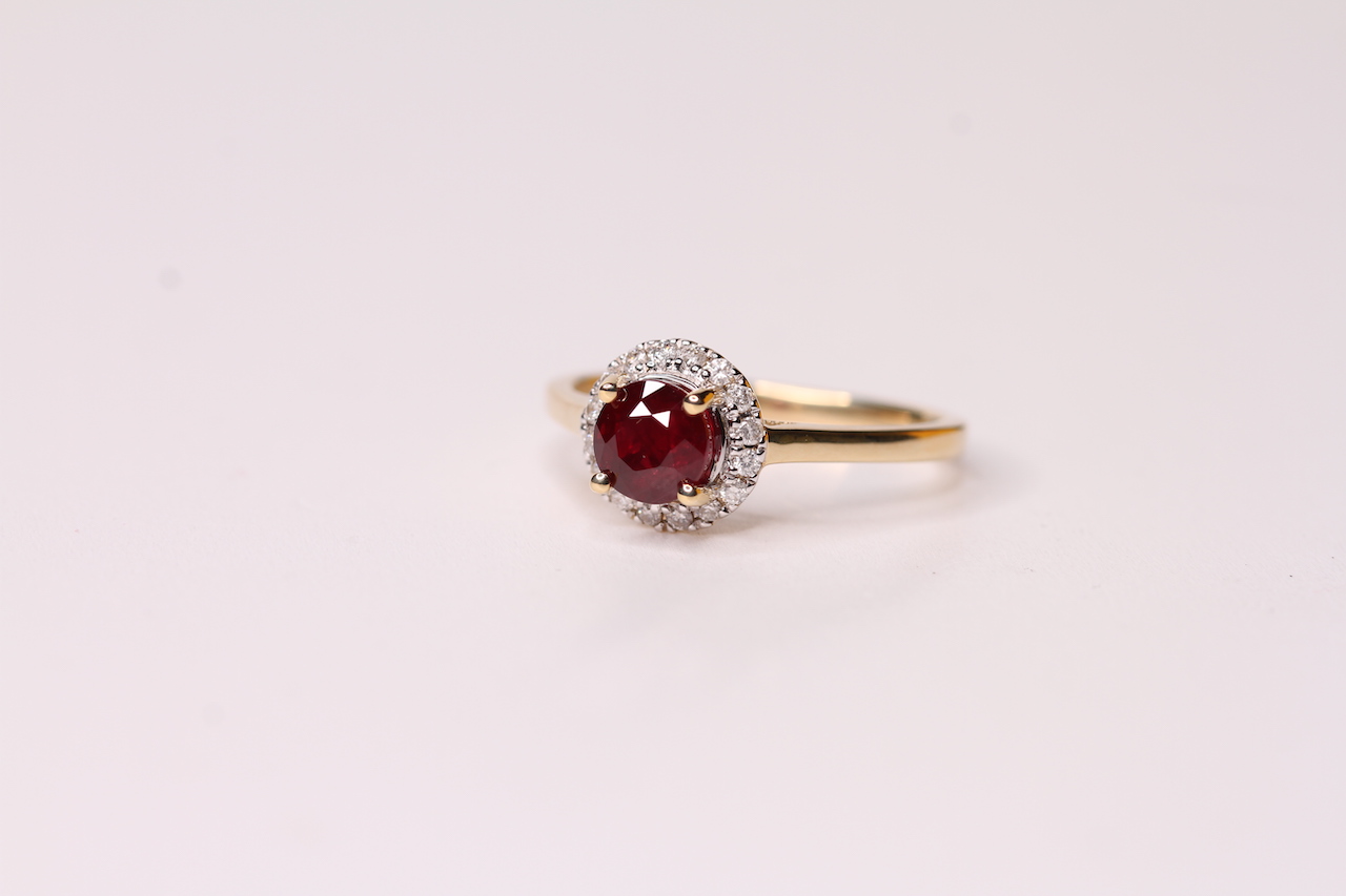 Natural Ruby & Diamond Ring, set with 1 round cut ruby 1.08ct, 16 round brilliant cut diamonds