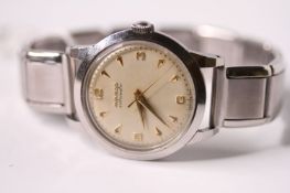 VINTAGE 1940S MOVADO BUMPER AUTOMATIC, circular cream dial, gilt dagger and Arabic hour markers