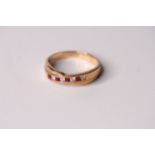 9ct Ruby and Diamond Ring, cross over band, with alternating rubies and diamonds, hallmarked 9ct ,