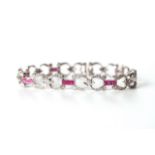 18ct Diamond and Ruby Bracelet, horse shoe Art Deco design, brilliant cut diamonds, 18cm long,