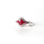 Platinum Ruby and Diamond Art Deco style ring, feature oval cut ruby, set with ruby shoulders,