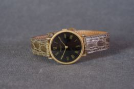 GENTLEMENS RAYMOND WEIL WRISTWATCH CIRCA 1970, circular maroon dial with gilt roman numeral hour