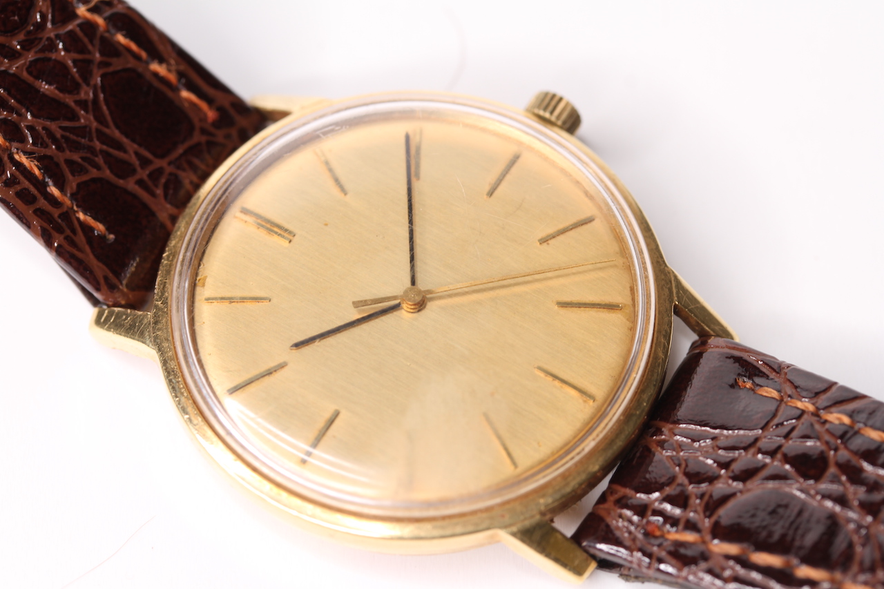 GENTLEMENS OMEGA SEAMASTER 18CT GOLD WRISTWATCH REF. 165008, circular champagne unsigned dial with