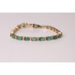Natural Emerald & Diamond Bracelet, set with 21 oval cut emeralds totalling 8.13ct, 42 round
