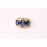 Natural Sapphire & Diamond Ring, set with 3 oval cut sapphires totalling 2.90ct, 32 round