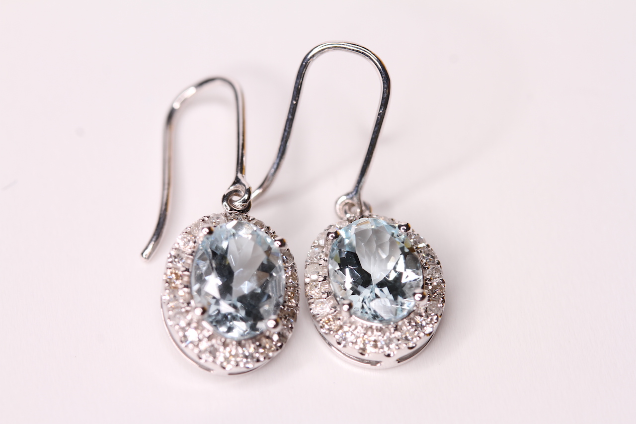 Pair of Natural Aquamarine and Diamond Earrings, set with 2 oval cut aquamarines totalling 2.12ct,