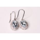 Pair of Natural Aquamarine and Diamond Earrings, set with 2 oval cut aquamarines totalling 2.12ct,