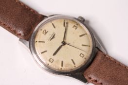 VINTAGE LONGINES DRESS WATCH, cream dial, baton and Arabic numerals at 12,3,6,9, 24mm steel case,