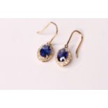 Pair of Sapphire & Diamond Earrings, set with 2 oval cut natural sapphires totalling 2.05ct,