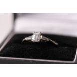 0.50ct Emerald cut diamond ring, emerald cut diamond with a tapered cut to each shoulder,