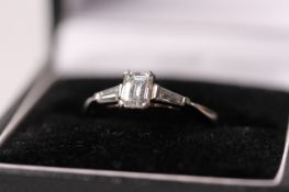 0.50ct Emerald cut diamond ring, emerald cut diamond with a tapered cut to each shoulder,