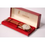 VINTAGE OMEGA DRESS WATCH WITH BOX REFERENCE 121.081-63, CIRCA 1963, circular off white dial, gold