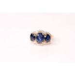 Natural Sapphire & Diamond Ring, set with 3 oval cut sapphires totalling 3.30ct, 32 round